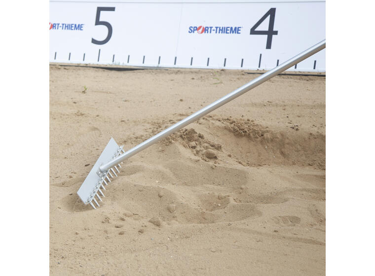 rake with scraper for jump pit 