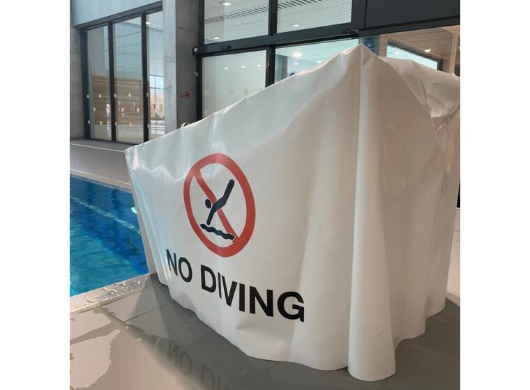 Suojapeite | Lähtötelineille Tekstillä: No diving 